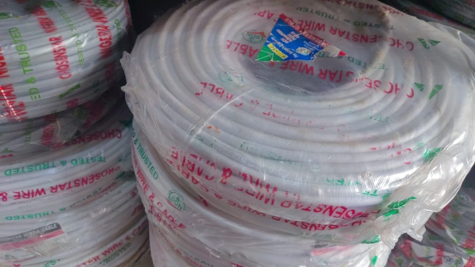 Coils of Chosen Star electrical wire in protective packaging